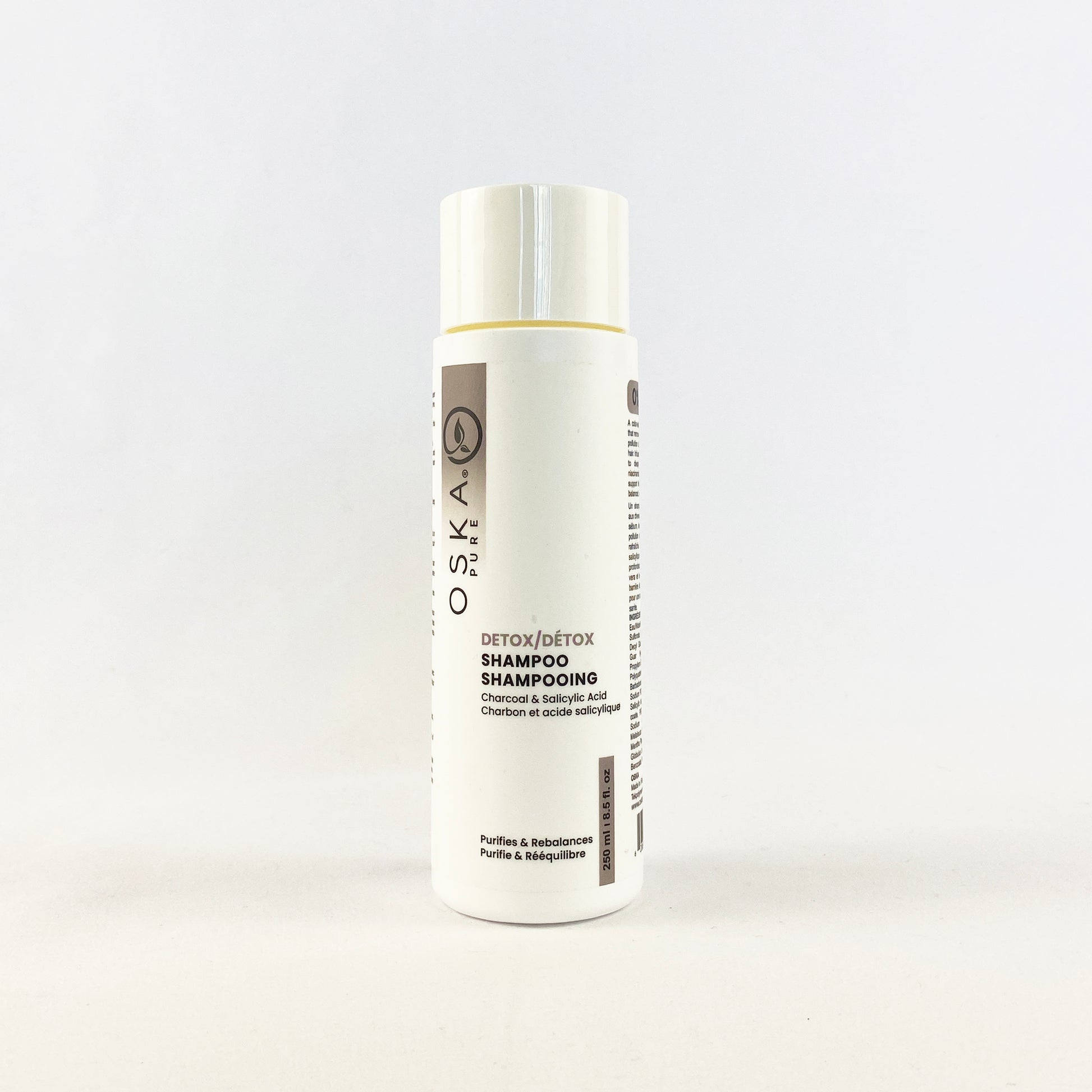 Oska Detox Shampoo bottle on a white background